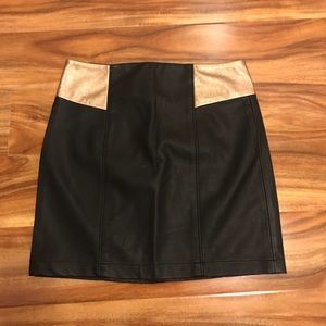 Gold and black mini skirt